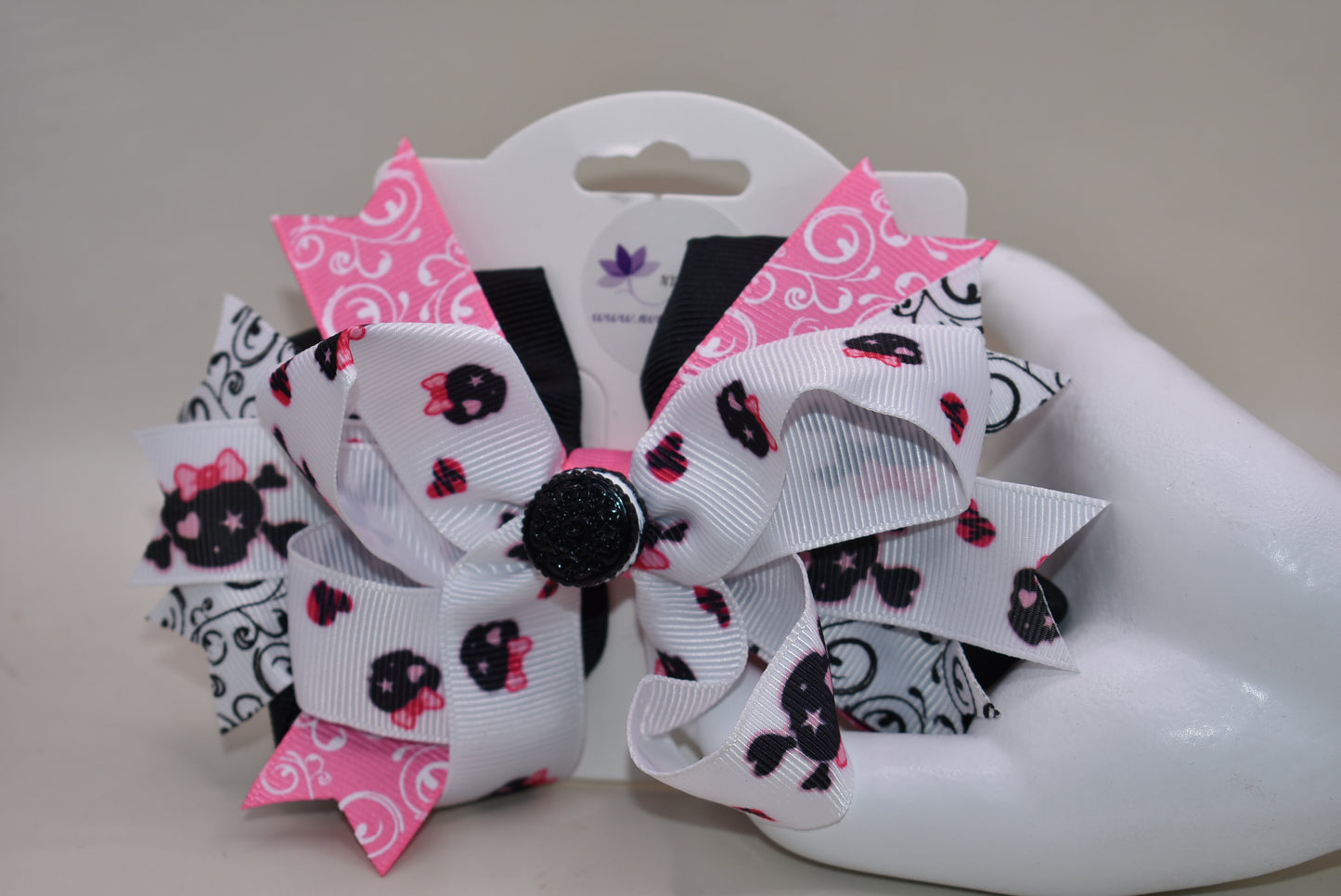The Bow Corner: The cutest oreo cookie bow! Pink, white, and black materials are mixed together, and a clip on the back makes it easy to put on and take off. Your little girl won't be able to resist this delightful accessory!