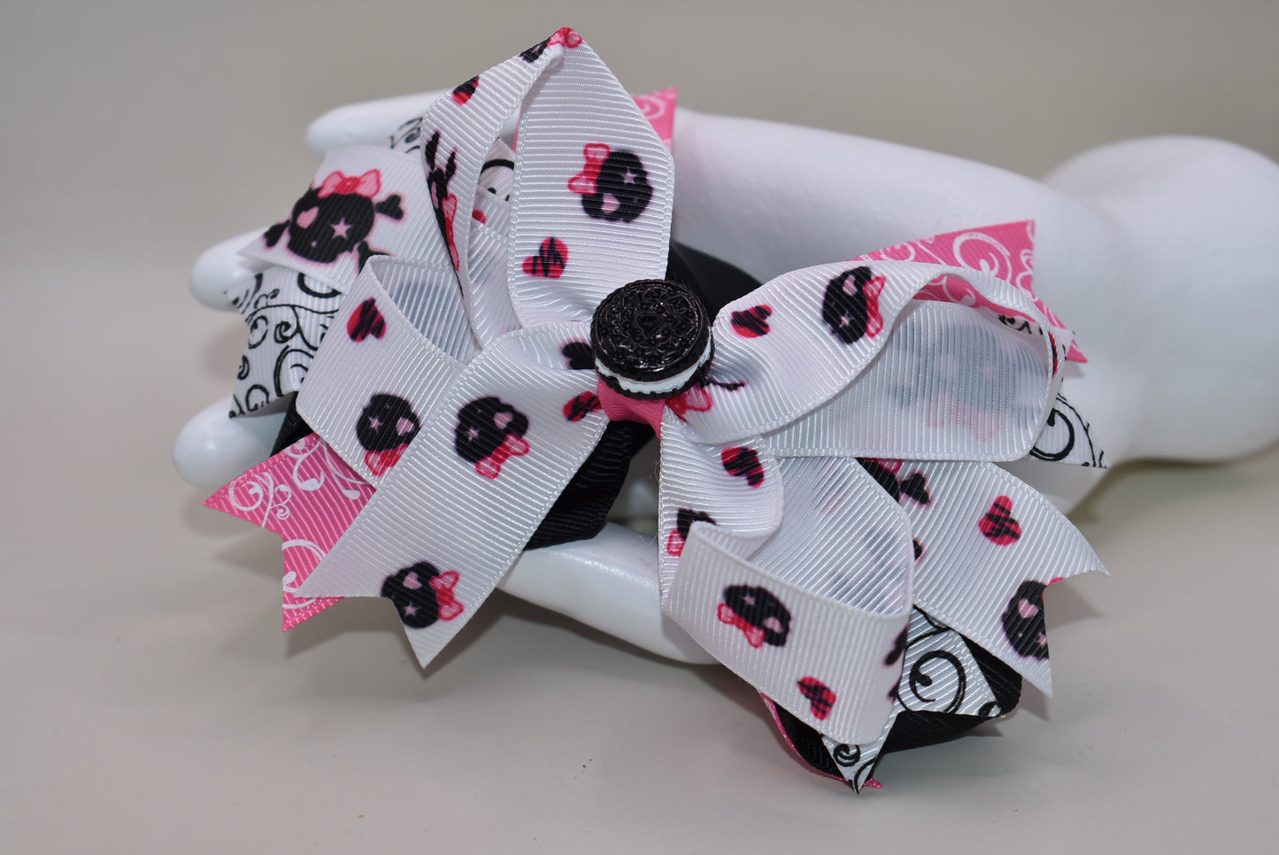 The Bow Corner: The cutest oreo cookie bow! Pink, white, and black materials are mixed together, and a clip on the back makes it easy to put on and take off. Your little girl won't be able to resist this delightful accessory!