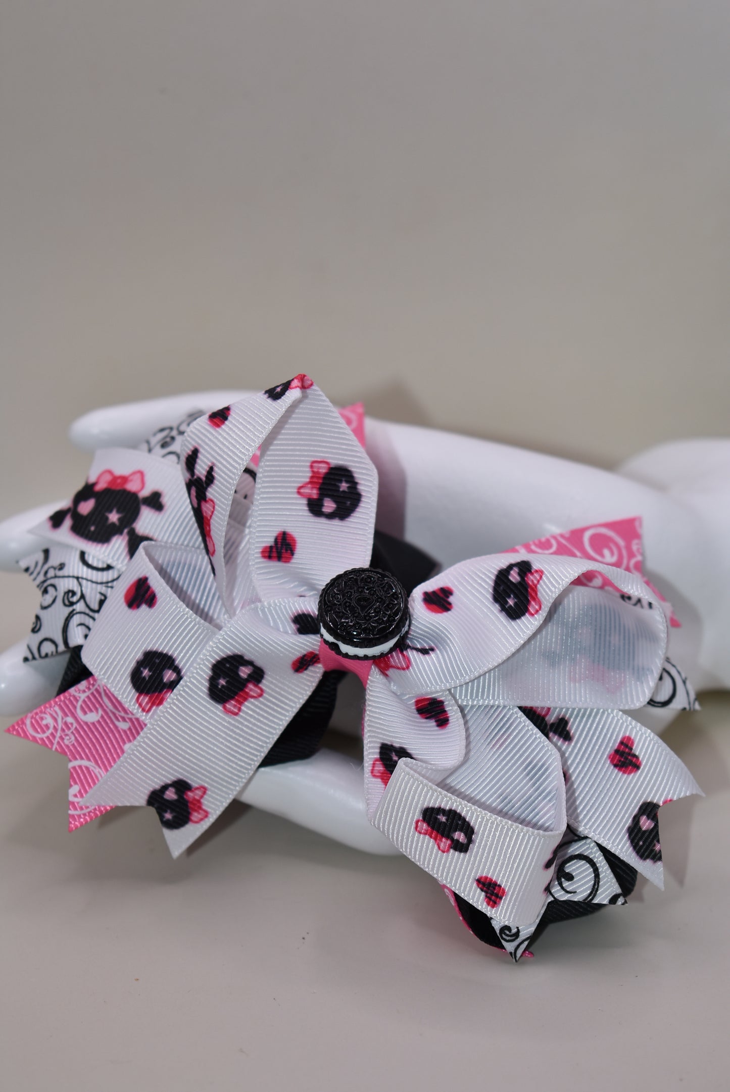 The Bow Corner: The cutest oreo cookie bow! Pink, white, and black materials are mixed together, and a clip on the back makes it easy to put on and take off. Your little girl won't be able to resist this delightful accessory!
