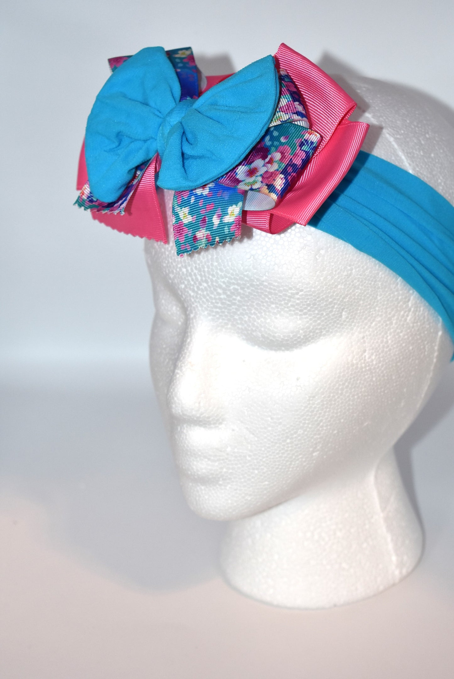 Add a splash of fun to your look with this Wrapped Headband from our Collection 4! π Featuring soft pink and blue hues and a charming flower motif πΈ, itβs perfect for anyone who loves a cheerful pop of color. One-of-a-kind and delightfully playful, this headband brightens any outfit with a touch of whimsy! β¨