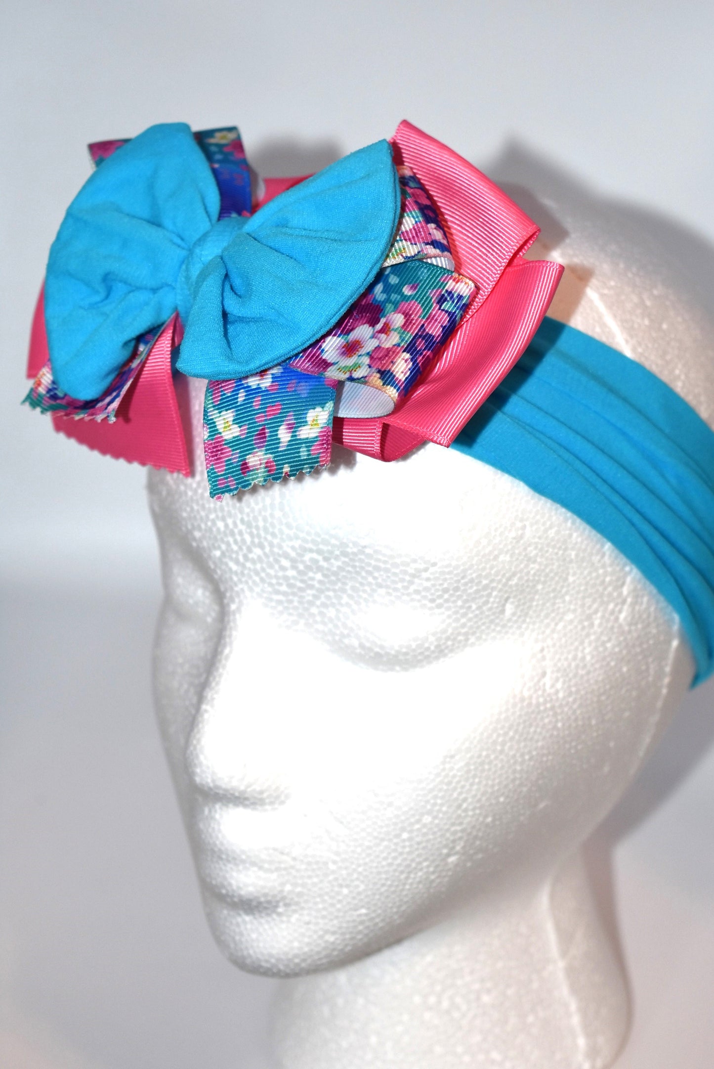 Add a splash of fun to your look with this Wrapped Headband from our Collection 4! π Featuring soft pink and blue hues and a charming flower motif πΈ, itβs perfect for anyone who loves a cheerful pop of color. One-of-a-kind and delightfully playful, this headband brightens any outfit with a touch of whimsy! β¨