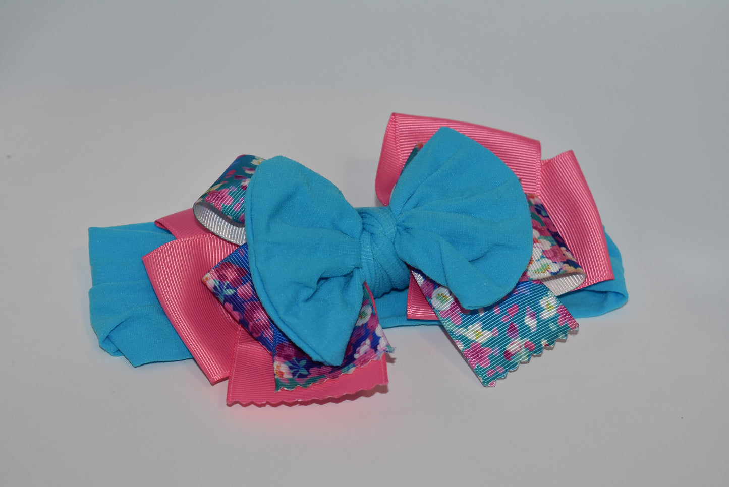 Add a splash of fun to your look with this Wrapped Headband from our Collection 4! π Featuring soft pink and blue hues and a charming flower motif πΈ, itβs perfect for anyone who loves a cheerful pop of color. One-of-a-kind and delightfully playful, this headband brightens any outfit with a touch of whimsy! β¨