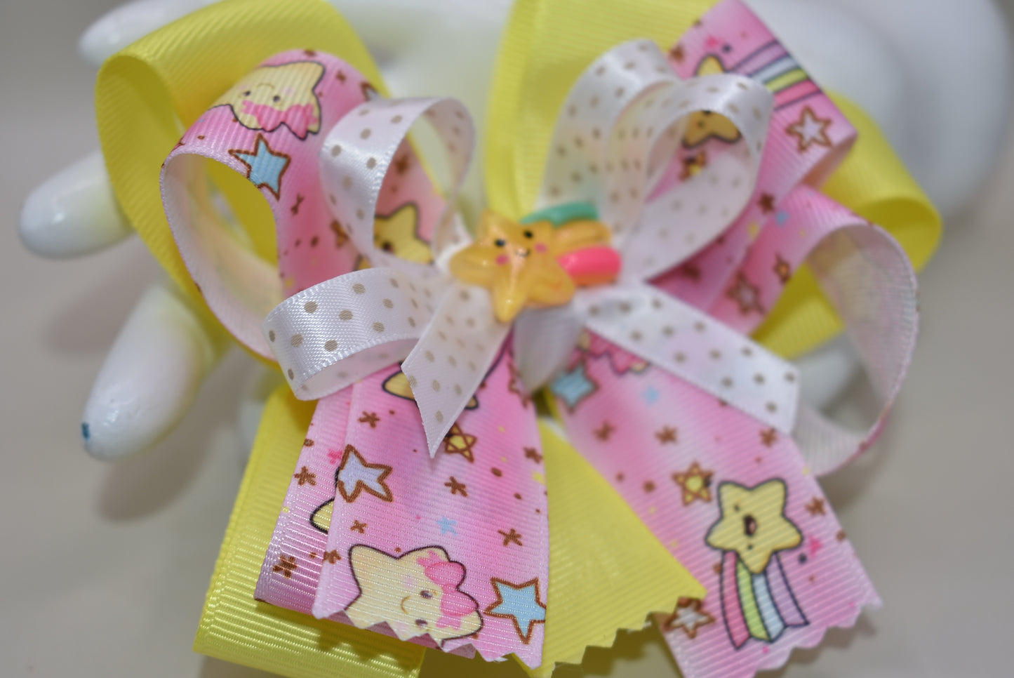 Brighten your little starβs day with this adorable yellow bow featuring a charming stars ribbon motif β¨π! Complete with a cute star charm and a rainbow π, itβs the perfect playful accessory to bring smiles and sparkle to any outfit. Love you to the stars and back! πβ