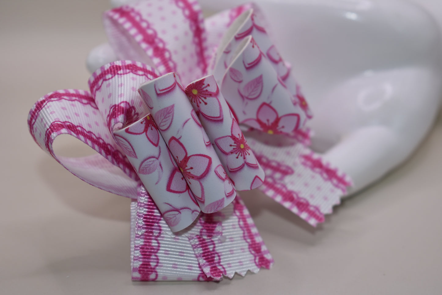 Add a pop of playful charm with this Nana' Collection 100 hair clip! Featuring a pretty pink flower made from soft faux leather, itβs perfectly framed by matching grosgrain ribbon for extra sweetness. The wrapped alligator clip ensures a comfy, secure hold all day long. πΈπβ¨ Perfect for brightening up any hairstyle with a touch of fun!