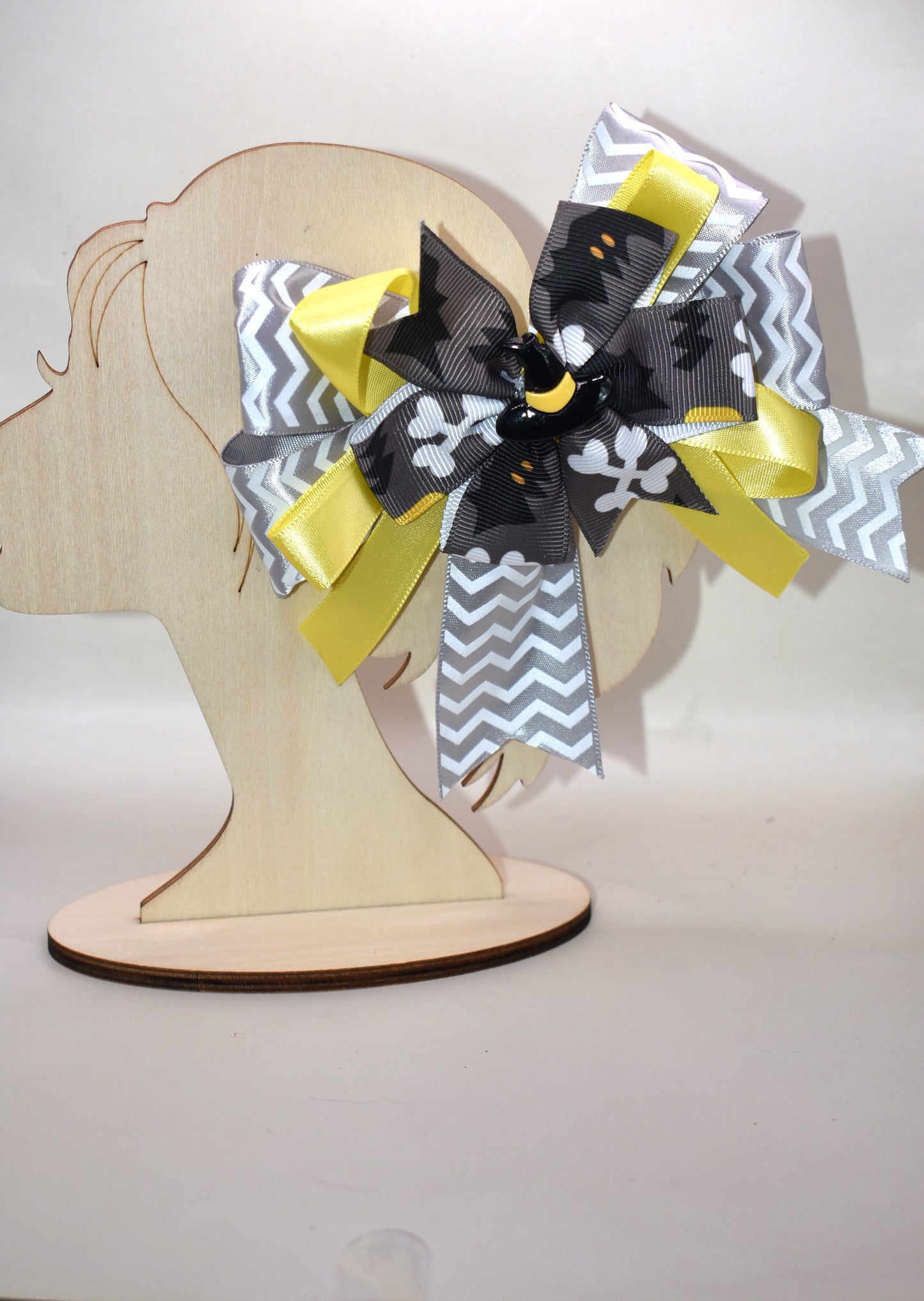Add a pop of spooky fun with this crazy witches hat π©β¨! Perched atop a swirl of lively yellow and grey ribbons, itβs the perfect playful touch for your Halloween look ππ». The wrapped alligator clip ensures a comfy, secure fit so you can dance through the season with ease. Get ready for trick-or-treating in style! πΈοΈπ€