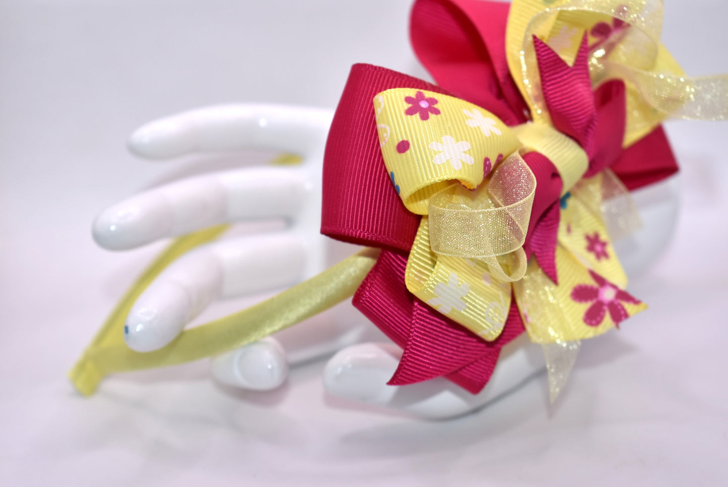 Elevate your style with this stunning bright pink and yellow floral headband! πΈβ¨ Crafted from soft, flexible satin, it glides smoothly over your hair without tugging or discomfort. Whether you're heading to brunch, a special event, or just want to add pizzazz to your everyday look, this one-of-a-kind beauty keeps you feeling fabulous all day long. ππ The perfect finishing touch that transforms any outfit from ordinary to absolutely gorgeous!