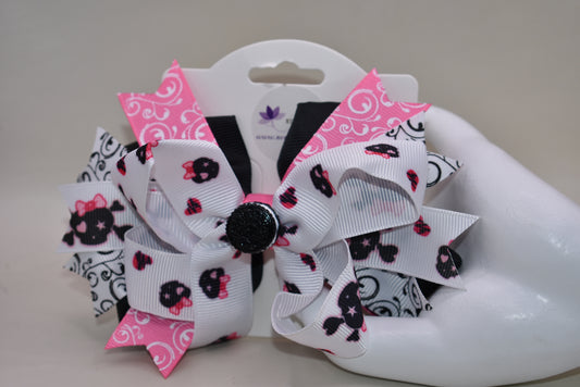 The Bow Corner: The cutest oreo cookie bow! Pink, white, and black materials are mixed together, and a clip on the back makes it easy to put on and take off. Your little girl won't be able to resist this delightful accessory!