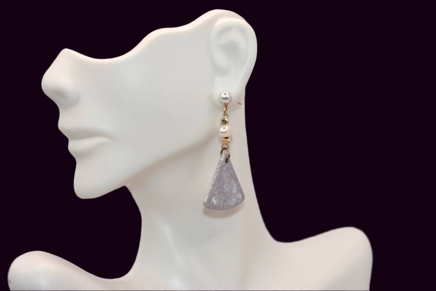 Introducing the playful Gray Collection! These beautiful stainless steel pearl posts hang comfortably on your ear, adding a stylish and lightweight touch to any outfit. Less than 2 inches, these earrings are super comfortable for all day wear.