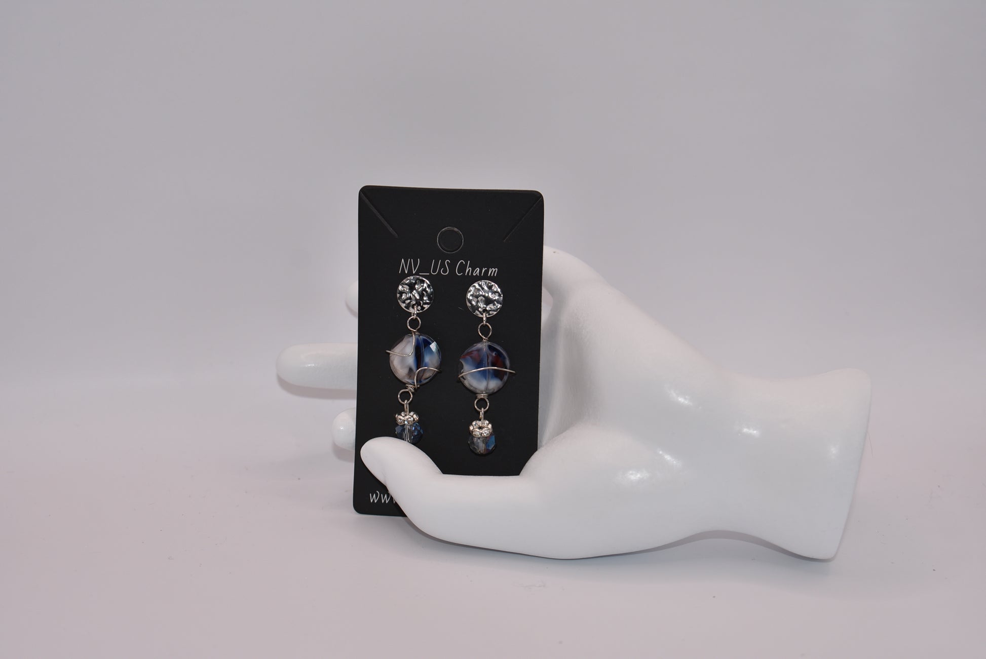 Introducing the Blue Collection! These silver post earrings feature a beautiful stone with crystal accents, adding a touch of sparkle to your look. With a lightweight and comfortable design, these earrings are perfect for all day wear. Love a good pair of blue earrings? Then these are a must-have for your jewelry collection!