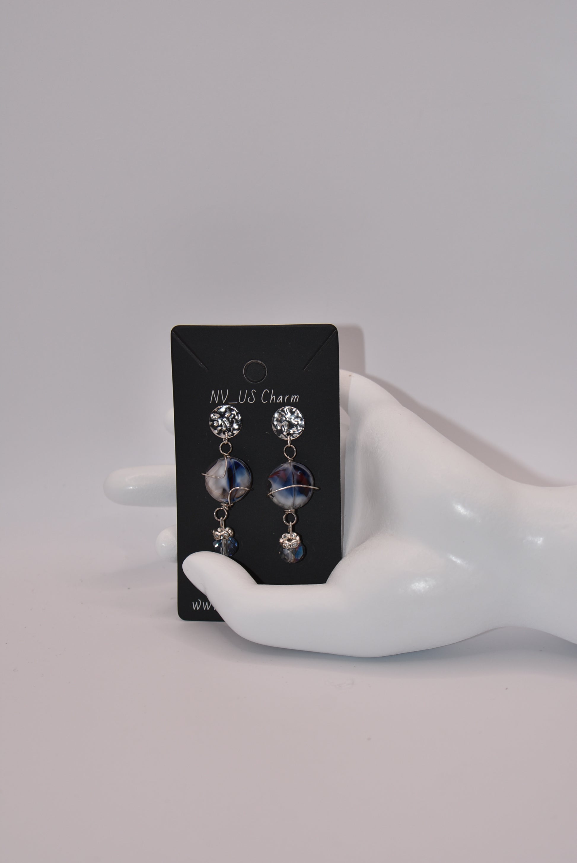 Introducing the Blue Collection! These silver post earrings feature a beautiful stone with crystal accents, adding a touch of sparkle to your look. With a lightweight and comfortable design, these earrings are perfect for all day wear. Love a good pair of blue earrings? Then these are a must-have for your jewelry collection!