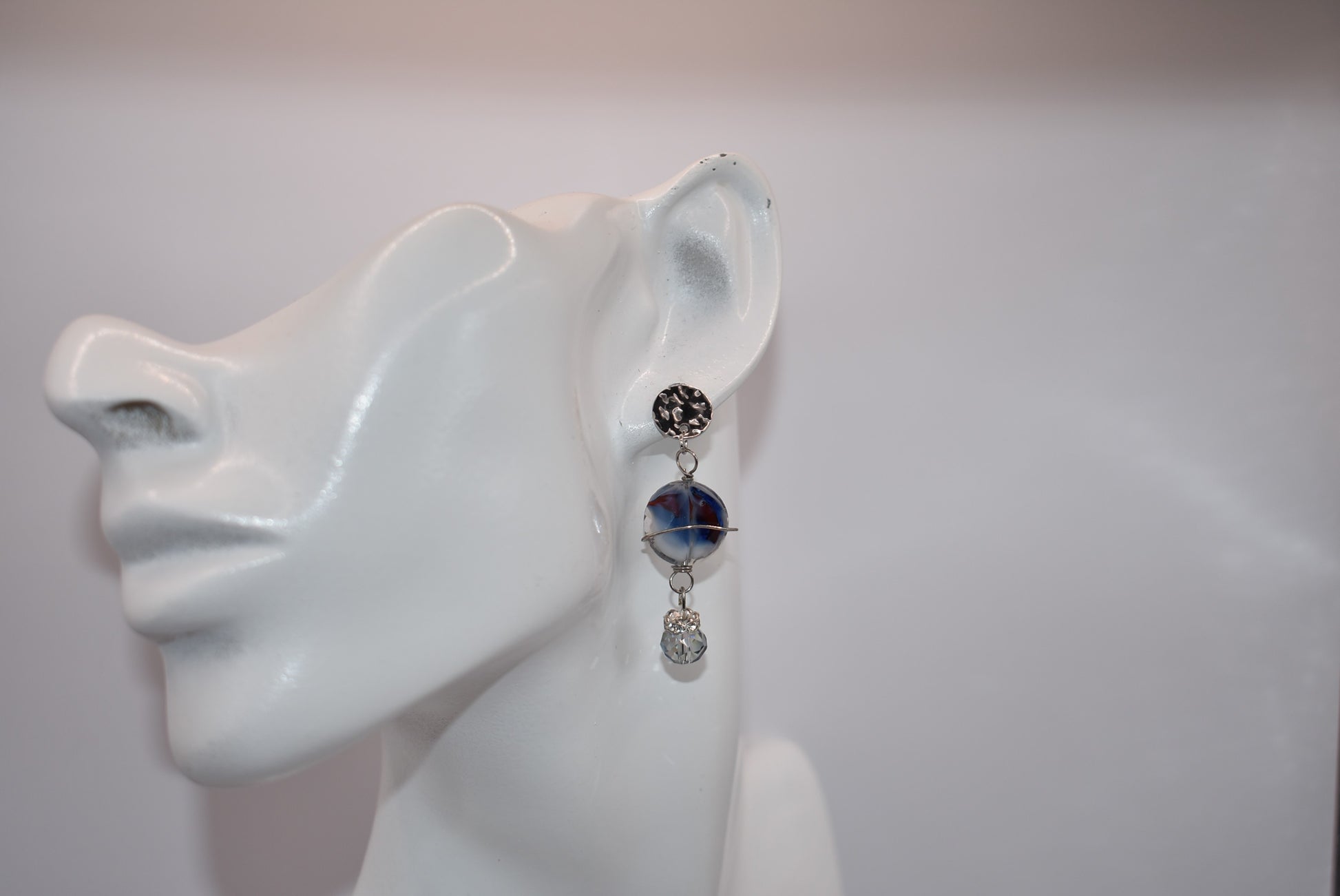 Introducing the Blue Collection! These silver post earrings feature a beautiful stone with crystal accents, adding a touch of sparkle to your look. With a lightweight and comfortable design, these earrings are perfect for all day wear. Love a good pair of blue earrings? Then these are a must-have for your jewelry collection!