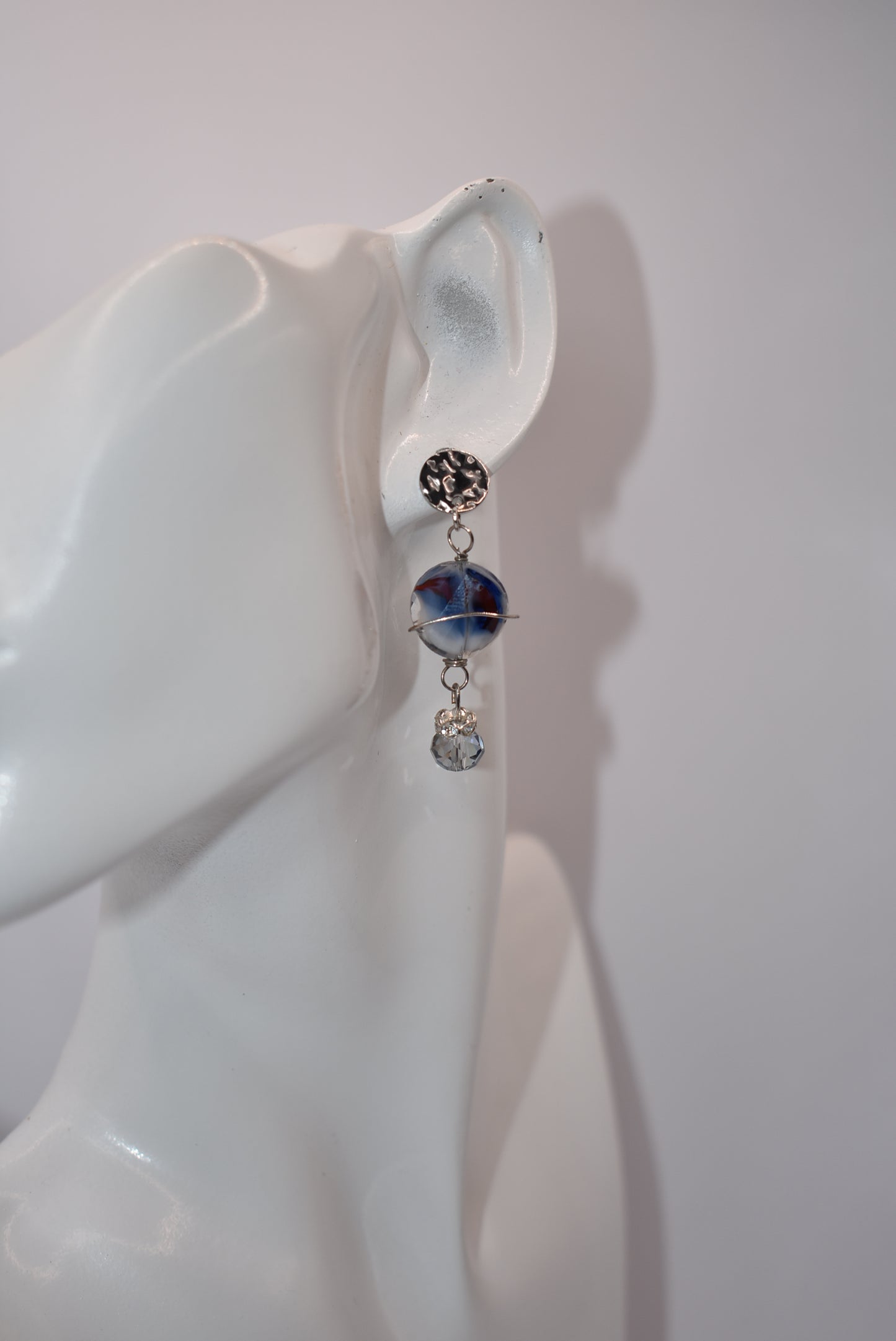 Introducing the Blue Collection! These silver post earrings feature a beautiful stone with crystal accents, adding a touch of sparkle to your look. With a lightweight and comfortable design, these earrings are perfect for all day wear. Love a good pair of blue earrings? Then these are a must-have for your jewelry collection!