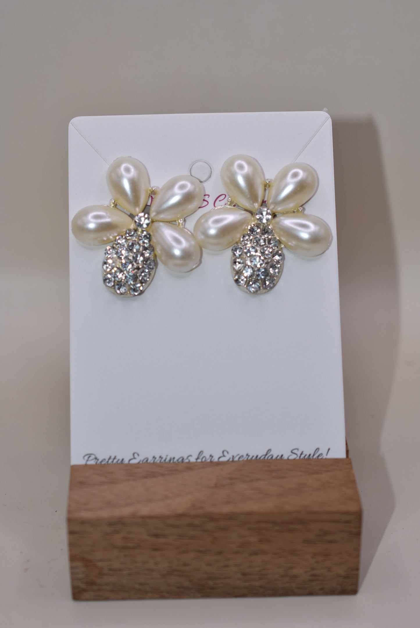 Don't settle for a run-of-the-mill wedding look! Make your big day sparkle with our Wedding Collection! Our one-of-a-kind earrings feature an ultra-glam pearl and gem flower design, and are lightweight and comfy on the ear. Plus, they're hypoallergenic so they won't weigh you down with sensitivities - now that's something to say "I do" to!