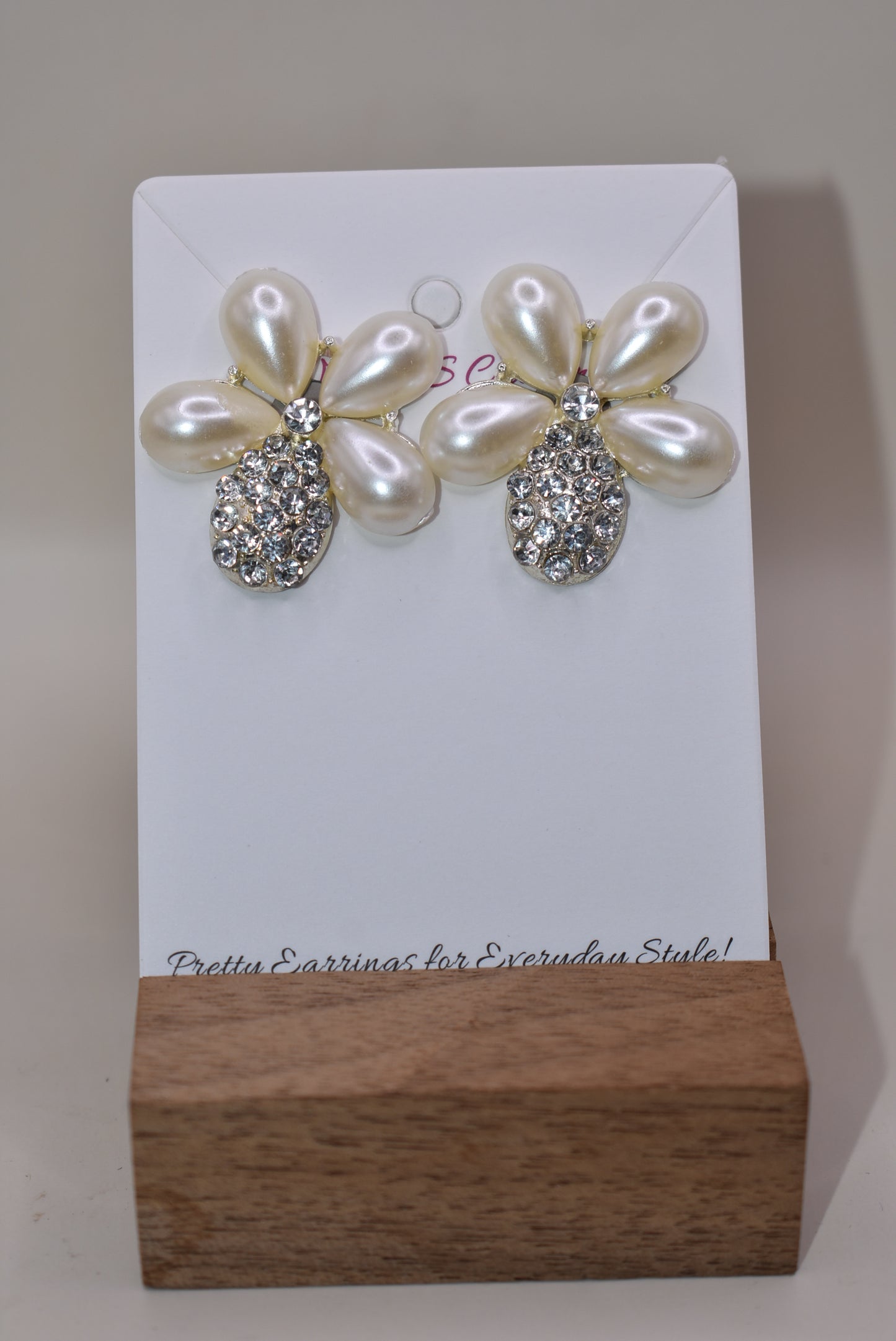 Don't settle for a run-of-the-mill wedding look! Make your big day sparkle with our Wedding Collection! Our one-of-a-kind earrings feature an ultra-glam pearl and gem flower design, and are lightweight and comfy on the ear. Plus, they're hypoallergenic so they won't weigh you down with sensitivities - now that's something to say "I do" to!