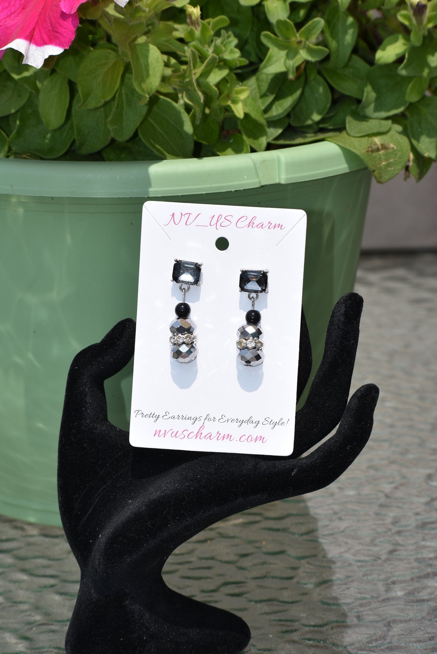 This Black Collection 13 earring set is crafted featuring exquisite black crystal square posts and intricately detailed gray and black beading. This timeless jewelry piece is designed to last, perfect for formal occasions or everyday wear.