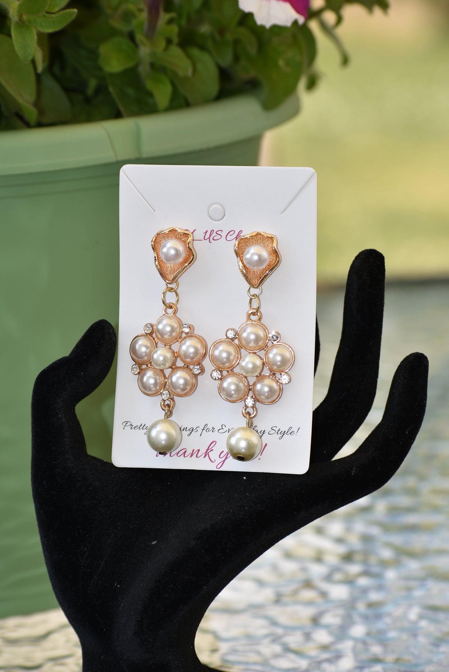 This luxurious Wedding Collection 13 features prestigious posts crafted from pearl and gold that hold a stunning cluster of pearls and crystals. A single suspended pearl adds an elegant finishing touch. Perfect for special occasions or any time you want to make a statement.