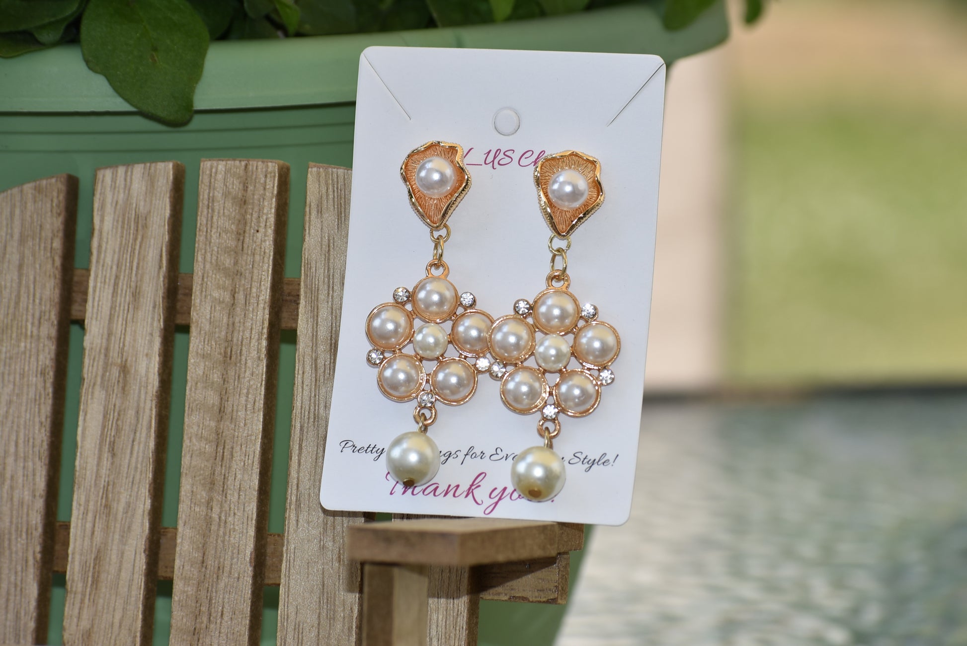 This luxurious Wedding Collection 13 features prestigious posts crafted from pearl and gold that hold a stunning cluster of pearls and crystals. A single suspended pearl adds an elegant finishing touch. Perfect for special occasions or any time you want to make a statement.