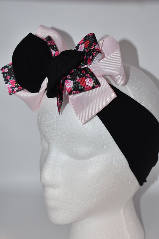 Add a splash of charm with this soft black and pink nylon headband featuring a lovely flower motif ribbon at the center 🌸. Its layered design brings extra beauty and fun, perfect for all ages! A unique, one-of-a-kind accessory to brighten up any outfit 🎀✨.