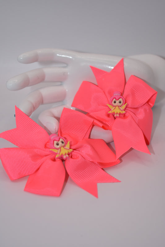 Add a touch of whimsy to your little girl's pigtails with Nana's Collection! This set of two pretty pink bows features adorable fairy designs on top to keep her safe. Plus, the alligator clip ensures a secure fit. Perfect for any playful princess!