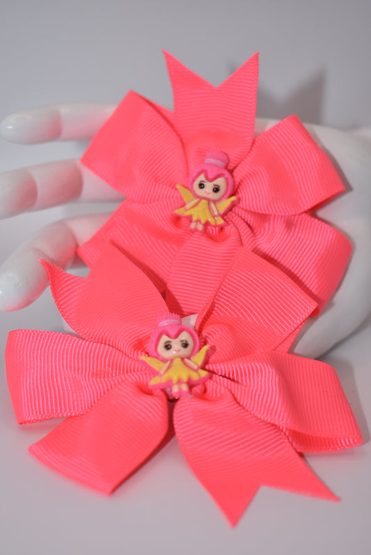 Add a touch of whimsy to your little girl's pigtails with Nana's Collection! This set of two pretty pink bows features adorable fairy designs on top to keep her safe. Plus, the alligator clip ensures a secure fit. Perfect for any playful princess!