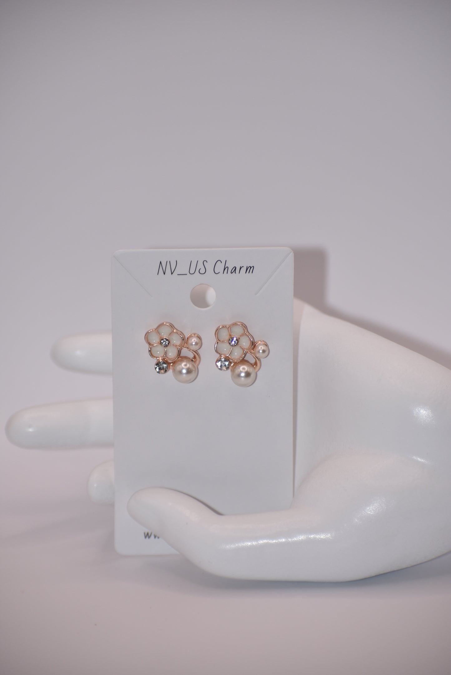 Exude elegance on your special day with our Wedding Collection. These post earrings feature a beautiful flower design adorned with luxurious pearls and crystals, adding a touch of class to your look. Comfortable for all-day wear, they are perfect for the bride or even the mother of the bride.