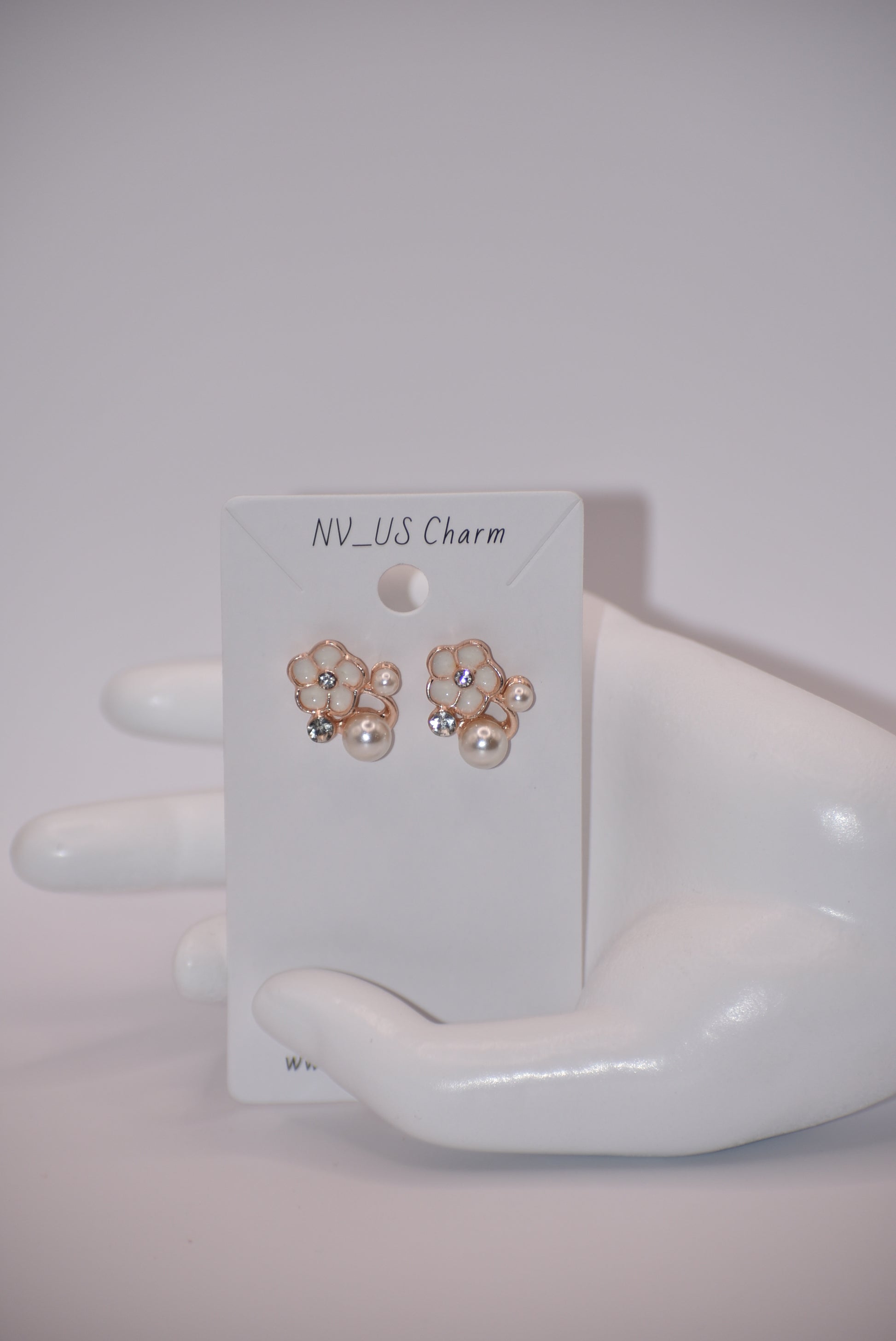 Exude elegance on your special day with our Wedding Collection. These post earrings feature a beautiful flower design adorned with luxurious pearls and crystals, adding a touch of class to your look. Comfortable for all-day wear, they are perfect for the bride or even the mother of the bride.