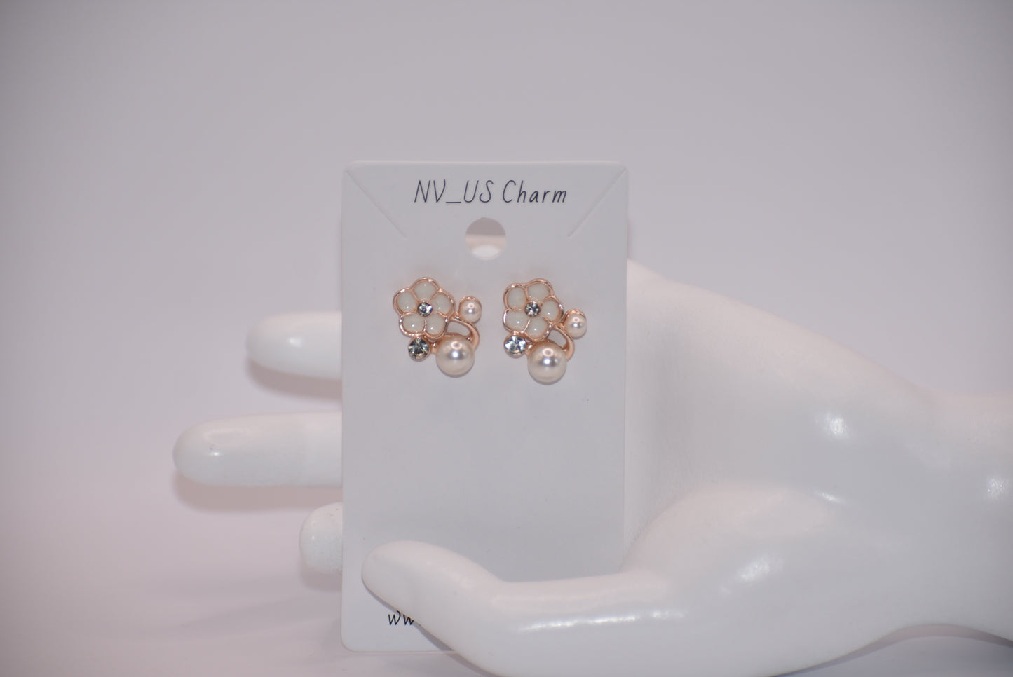 Exude elegance on your special day with our Wedding Collection. These post earrings feature a beautiful flower design adorned with luxurious pearls and crystals, adding a touch of class to your look. Comfortable for all-day wear, they are perfect for the bride or even the mother of the bride.