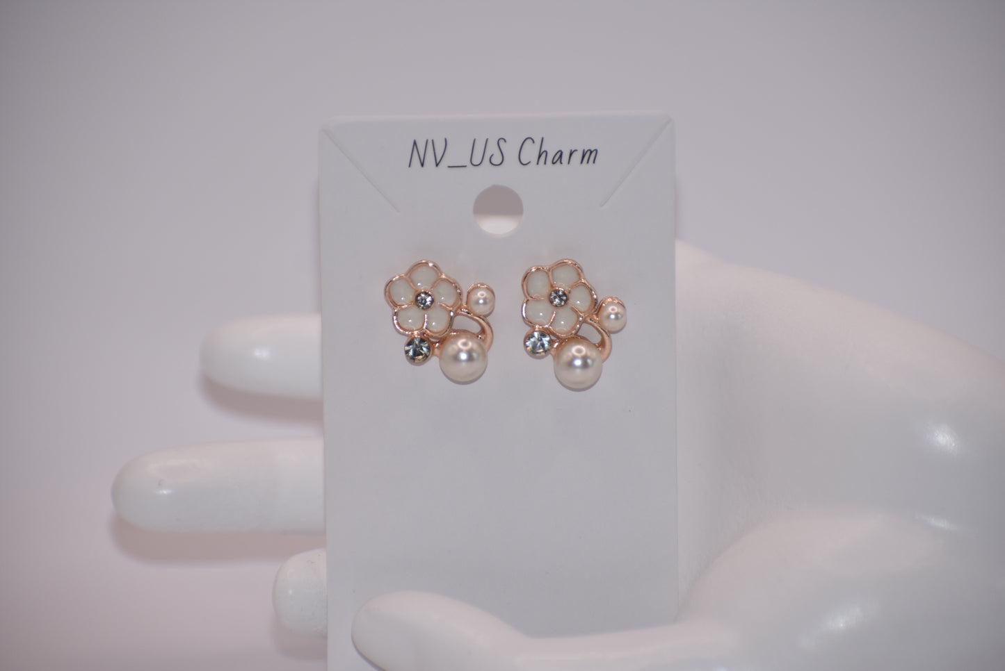 Exude elegance on your special day with our Wedding Collection. These post earrings feature a beautiful flower design adorned with luxurious pearls and crystals, adding a touch of class to your look. Comfortable for all-day wear, they are perfect for the bride or even the mother of the bride.