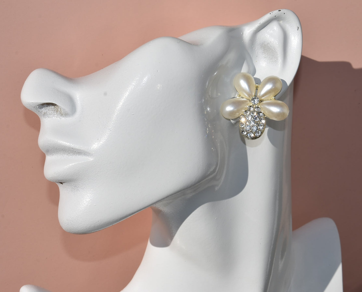 Don't settle for a run-of-the-mill wedding look! Make your big day sparkle with our Wedding Collection! Our one-of-a-kind earrings feature an ultra-glam pearl and gem flower design, and are lightweight and comfy on the ear. Plus, they're hypoallergenic so they won't weigh you down with sensitivities - now that's something to say "I do" to!