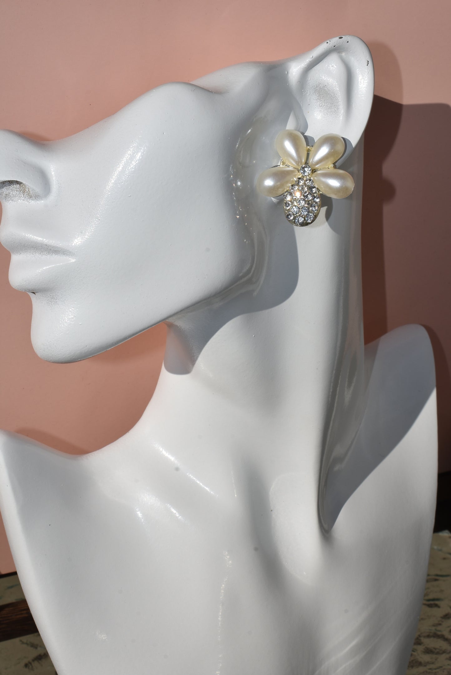 Don't settle for a run-of-the-mill wedding look! Make your big day sparkle with our Wedding Collection! Our one-of-a-kind earrings feature an ultra-glam pearl and gem flower design, and are lightweight and comfy on the ear. Plus, they're hypoallergenic so they won't weigh you down with sensitivities - now that's something to say "I do" to!