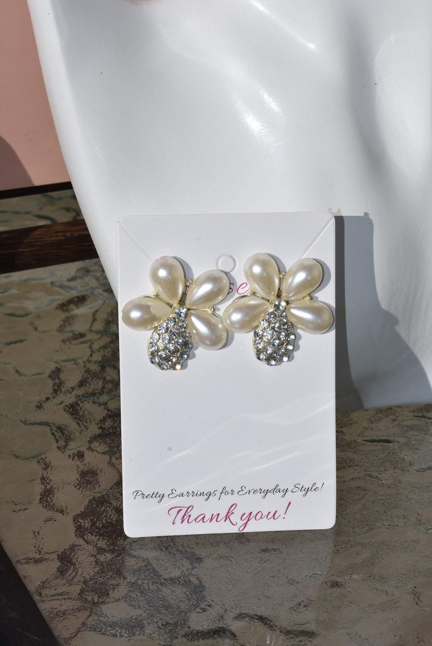 Don't settle for a run-of-the-mill wedding look! Make your big day sparkle with our Wedding Collection! Our one-of-a-kind earrings feature an ultra-glam pearl and gem flower design, and are lightweight and comfy on the ear. Plus, they're hypoallergenic so they won't weigh you down with sensitivities - now that's something to say "I do" to!