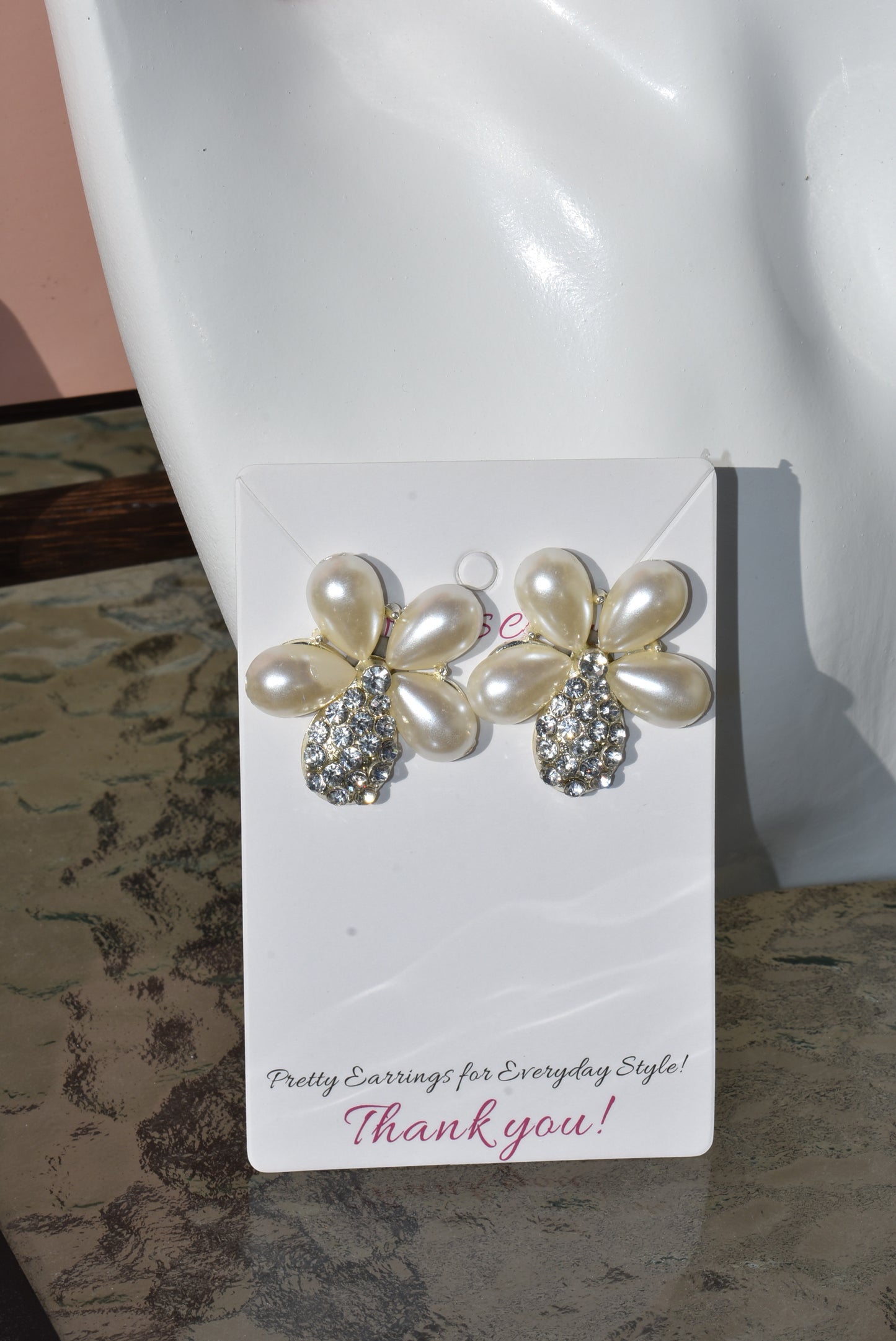 Don't settle for a run-of-the-mill wedding look! Make your big day sparkle with our Wedding Collection! Our one-of-a-kind earrings feature an ultra-glam pearl and gem flower design, and are lightweight and comfy on the ear. Plus, they're hypoallergenic so they won't weigh you down with sensitivities - now that's something to say "I do" to!