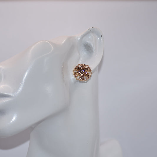 These charming auburn crystal flower earrings add a touch of elegance to your wedding look. The hypoallergenic gold posts provide all-day comfort for sensitive ears. Fall in love with the perfect amount of bling.