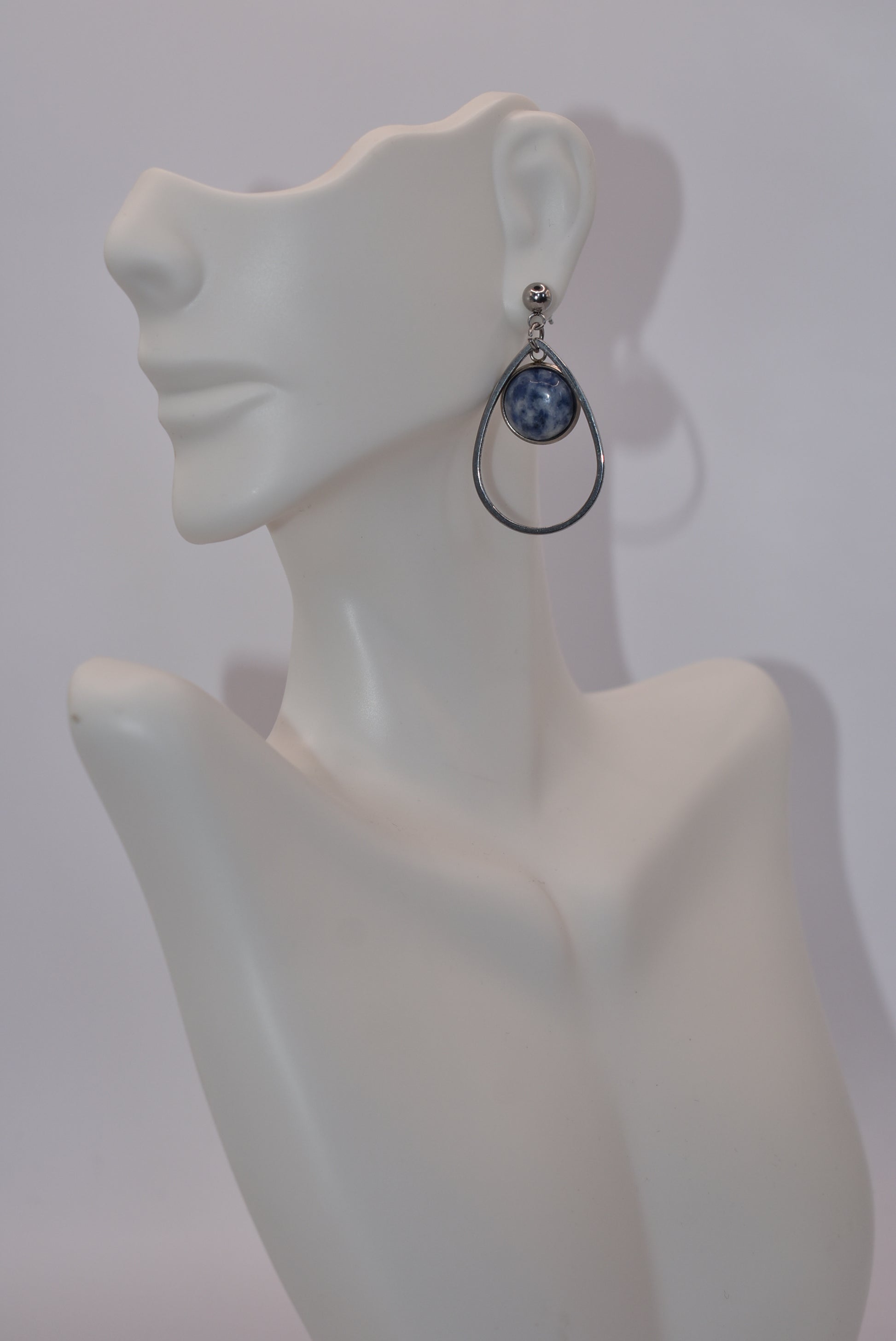 "Add some unique flair to your everyday look with our Blue Collection earrings! These silver hypoallergenic posts hold a teardrop open with a stunning cabochon stone center, ensuring both style and comfort. Perfect for all-day wear. (Your ears will thank you.)"&nbsp; Earrings can be work teardrop point up or down.&nbsp; Your choice gives you some variety