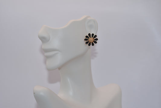 Add some style to your post earring game with the Black Collection. Featuring black flowers with gold accents, these hypoallergenic earrings are perfect for day or night. Show off your quirky side with this playful, yet sophisticated design.