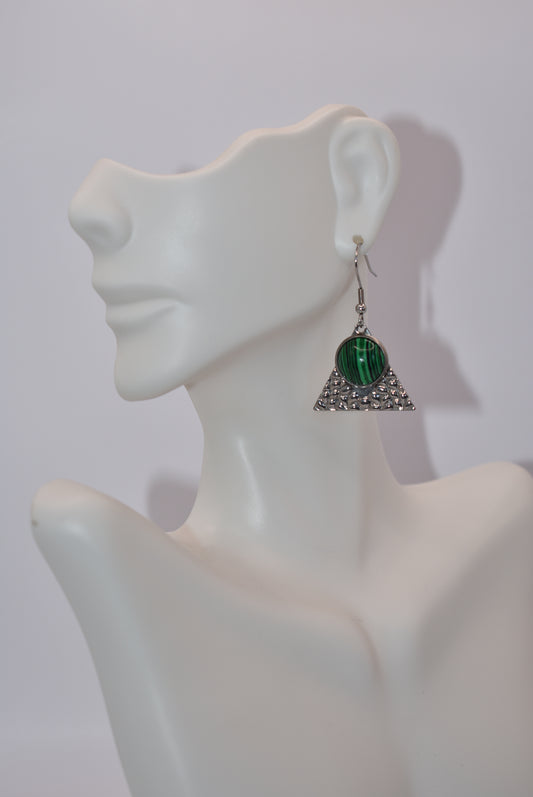 Stand out from the crowd with our Green Collection earrings! Featuring gorgeous green cabochons and a unique triangle stainless steel backing, these earrings are perfect for anyone looking for something different. The green tiger striped stone adds a touch of elegance, making them a must-have addition to your jewelry collection. Don't settle for ordinary, be bold with our Green Collection!