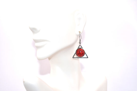 Elevate any outfit with the Red Collection! Our stainless-steel triangle hooks feature a stunning red tiger striped cabochon stone that will turn heads. Versatile and bold, this accessory is perfect for any occasion. Get ready to make a statement.