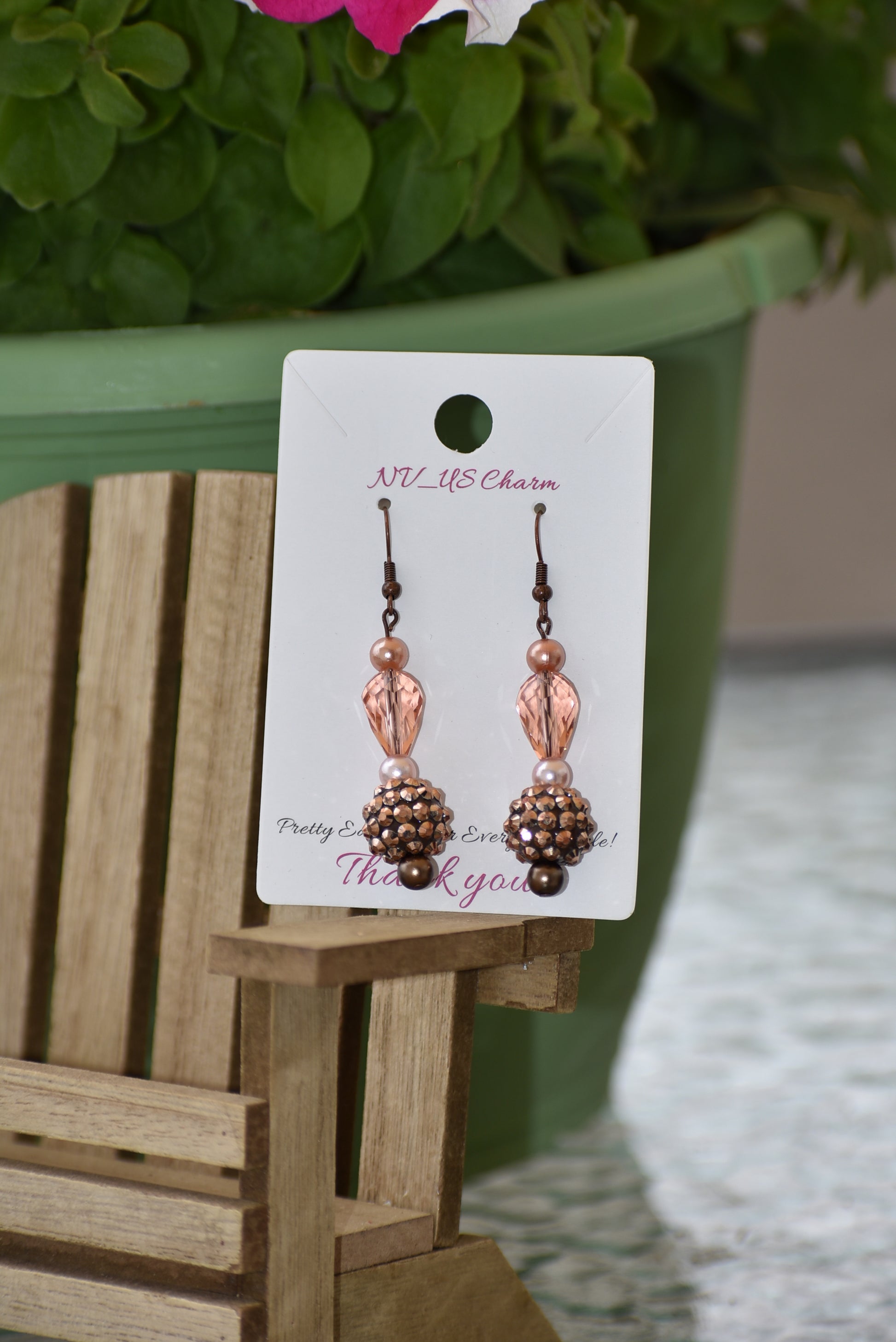 The Brown Collection 12 features stunning yet lightweight copper earrings with a unique combination of peach and copper beads and pearls. Hang in perfect proportions at the perfect length, these beautiful earrings are the perfect finishing touch to any ensemble.