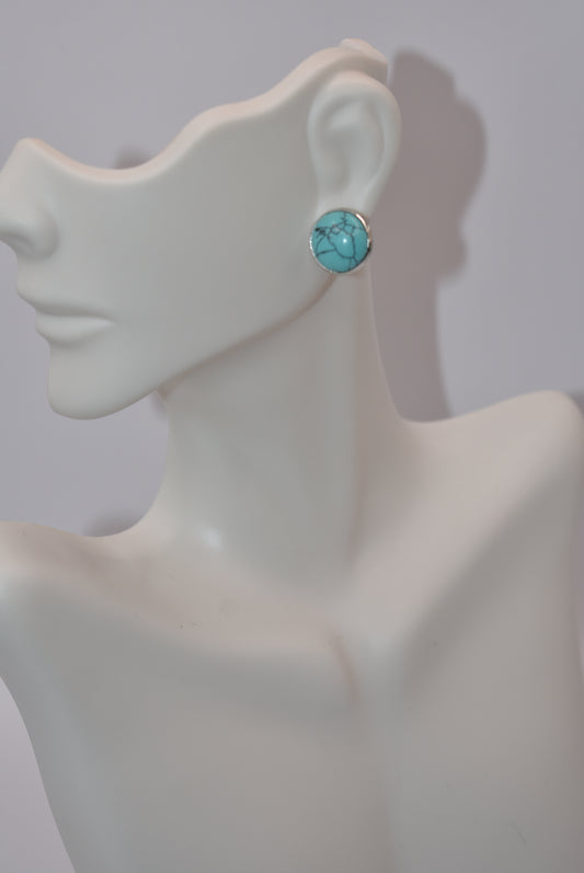 Indulge in heavenly style with these Western Collection post earrings. Featuring turquoise cabochon stones that symbolize kindness and protection, you'll fall in love with this pair and never want to take them off.