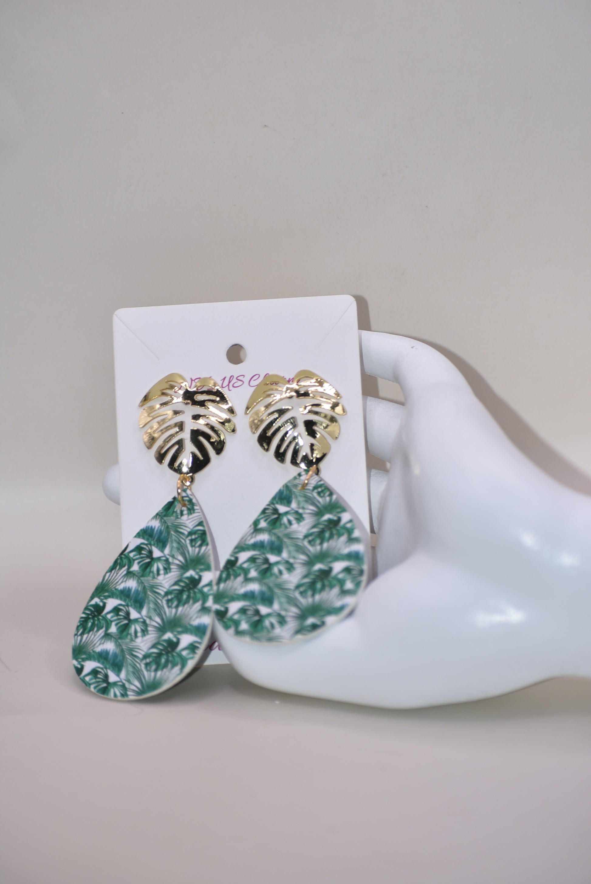 Add a touch of tropical vibes to your look with our Key West Collection. These pretty faux leather teardrops feature a unique palm tree gold filled post, perfect for all the palm tree lovers out there! With these earrings, you'll bring the beach anywhere you go." 🏝️🌴🌺