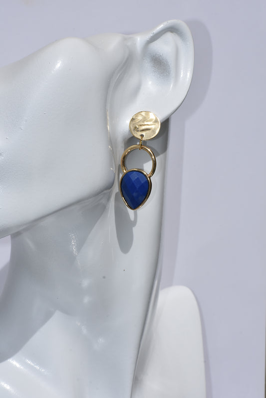 With a unique round hollow charm and a stunning blue pear shaped gem, the Blue Collection earrings on Gold Filled posts are the perfect addition to any outfit. They are hypoallergenic for sensitive ears and comfortable enough for all day wear. Perfect for pairing with jeans or any outfit.