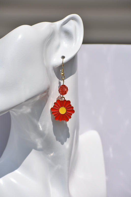 These fun red flowers with a yellow center are perfect for everyday wear.  I've added some pretty crystals to complete these earrings.