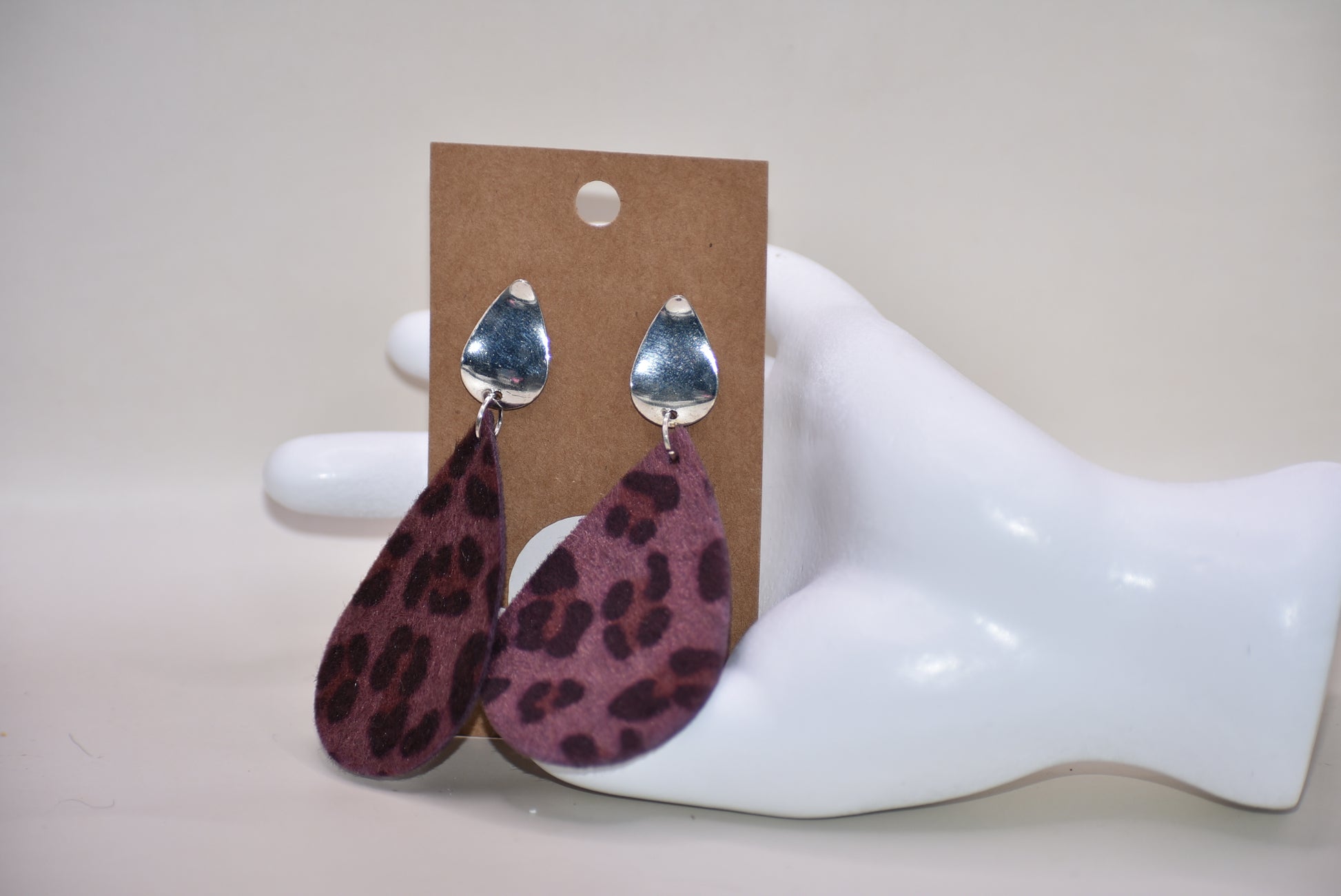 Unleash your wild side with our Safari Collection! 🐾 Featuring playful purple leopard print teardrop earrings 🎀 with pear-shaped silver filled posts for extra comfort. Lightweight design makes them easy to wear all day long! 🙌