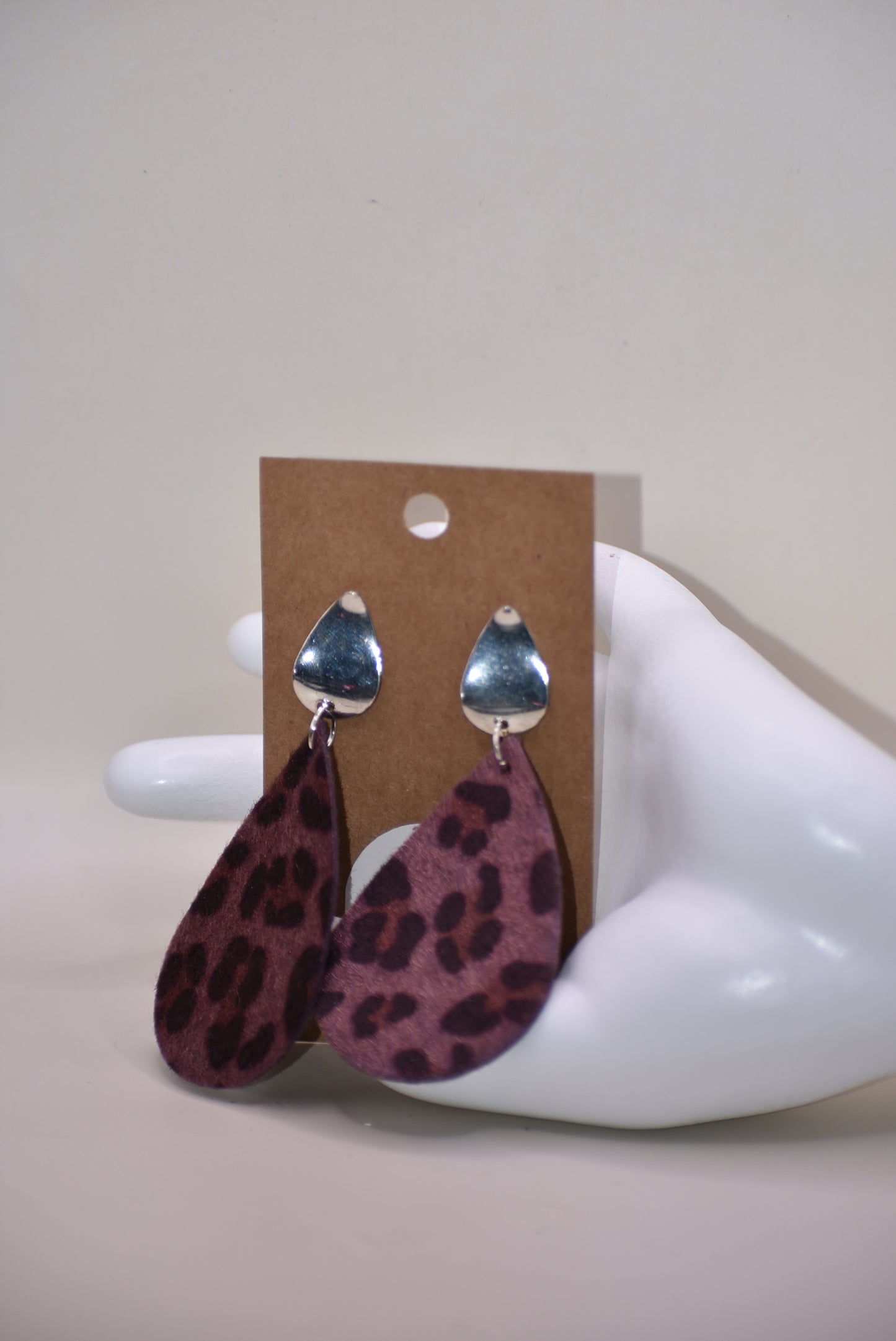 Unleash your wild side with our Safari Collection! 🐾 Featuring playful purple leopard print teardrop earrings 🎀 with pear-shaped silver filled posts for extra comfort. Lightweight design makes them easy to wear all day long! 🙌