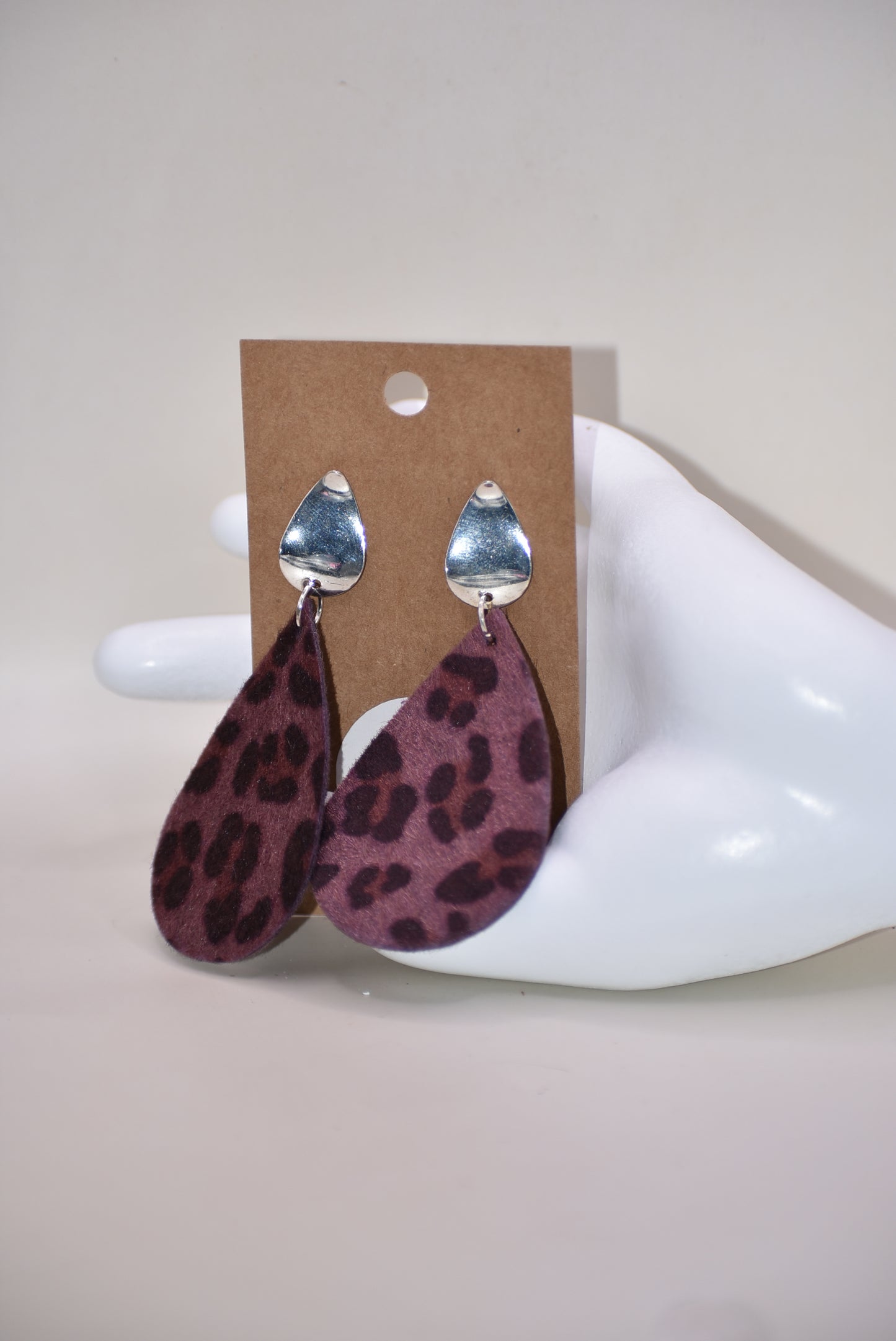 Unleash your wild side with our Safari Collection! 🐾 Featuring playful purple leopard print teardrop earrings 🎀 with pear-shaped silver filled posts for extra comfort. Lightweight design makes them easy to wear all day long! 🙌