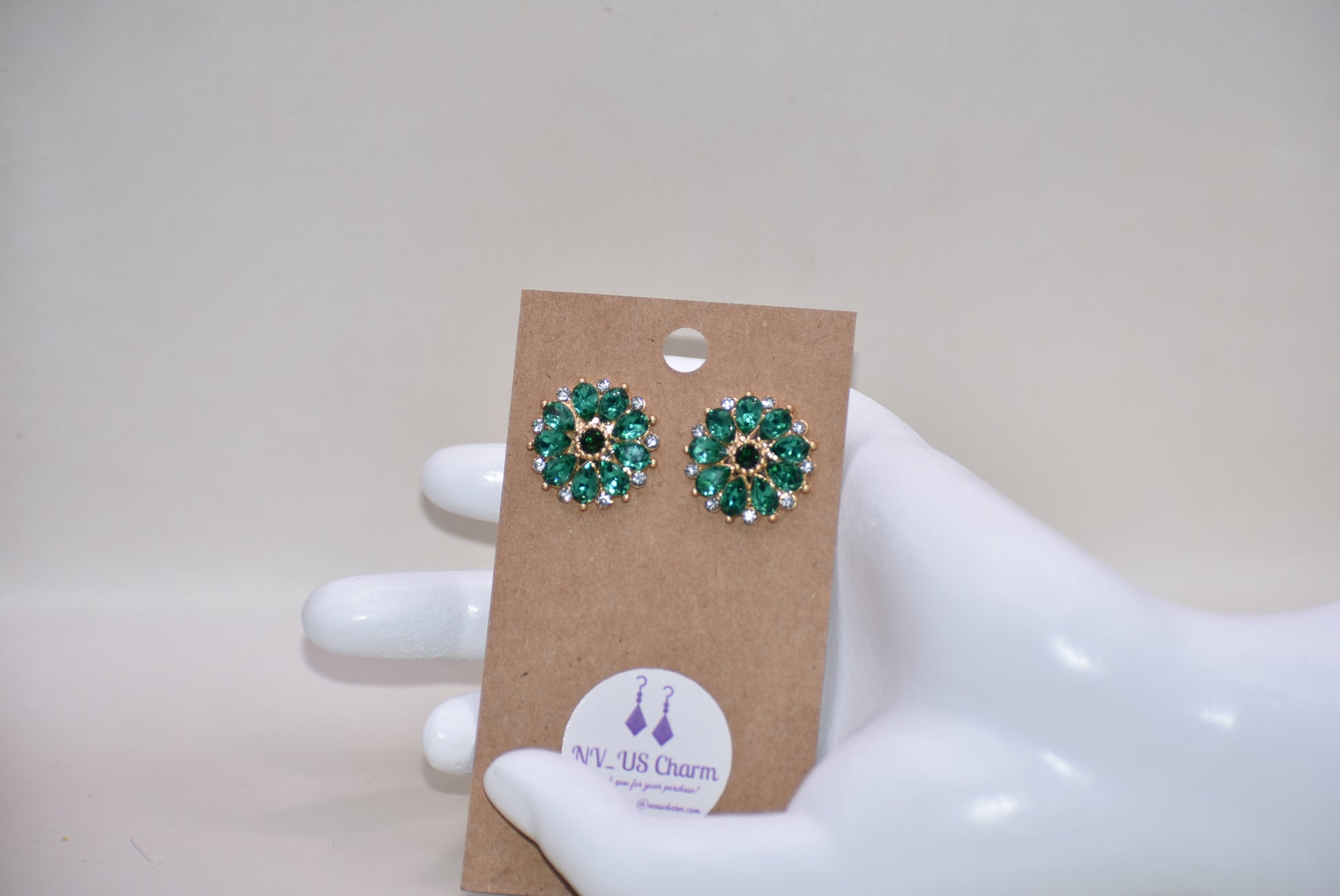 Unleash your unique style with our Green Collection earrings! These eye-catching post earrings feature hypoallergenic posts and stunning emerald green and white crystals. With a vintage-inspired design, you're sure to turn heads and make a statement. Perfect for any special occasion outfit!