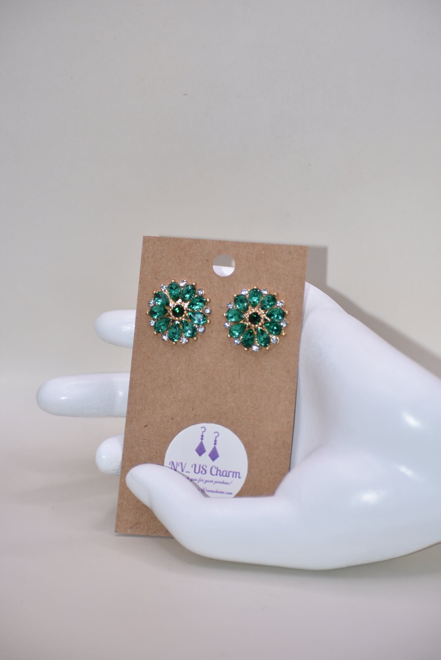 Unleash your unique style with our Green Collection earrings! These eye-catching post earrings feature hypoallergenic posts and stunning emerald green and white crystals. With a vintage-inspired design, you're sure to turn heads and make a statement. Perfect for any special occasion outfit!