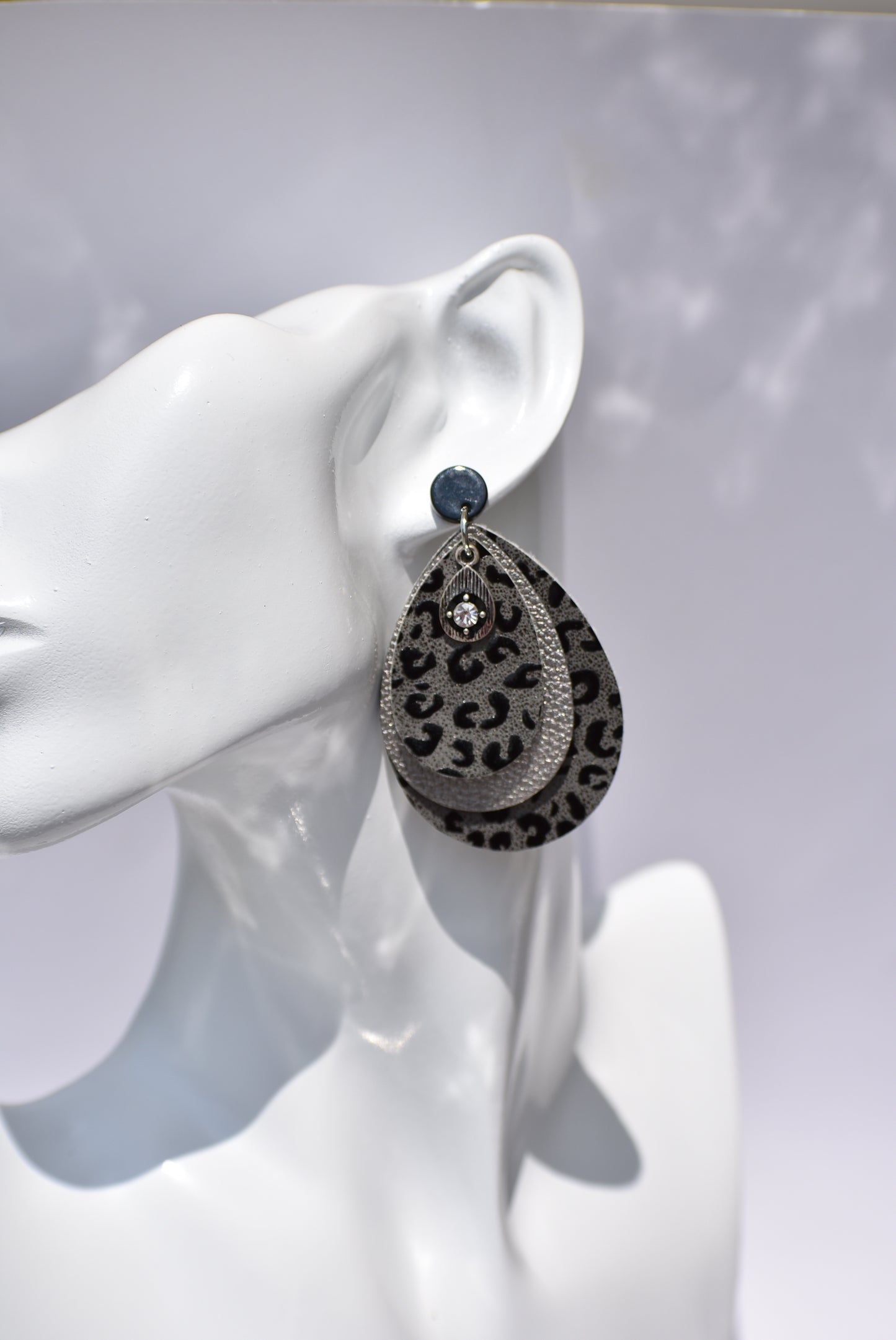 Black posts hold these gray/black leopard earrings with a pretty crystal charm. Super comfortable and perfect for that black sweater or shirt.  Definitely an attention getter.  