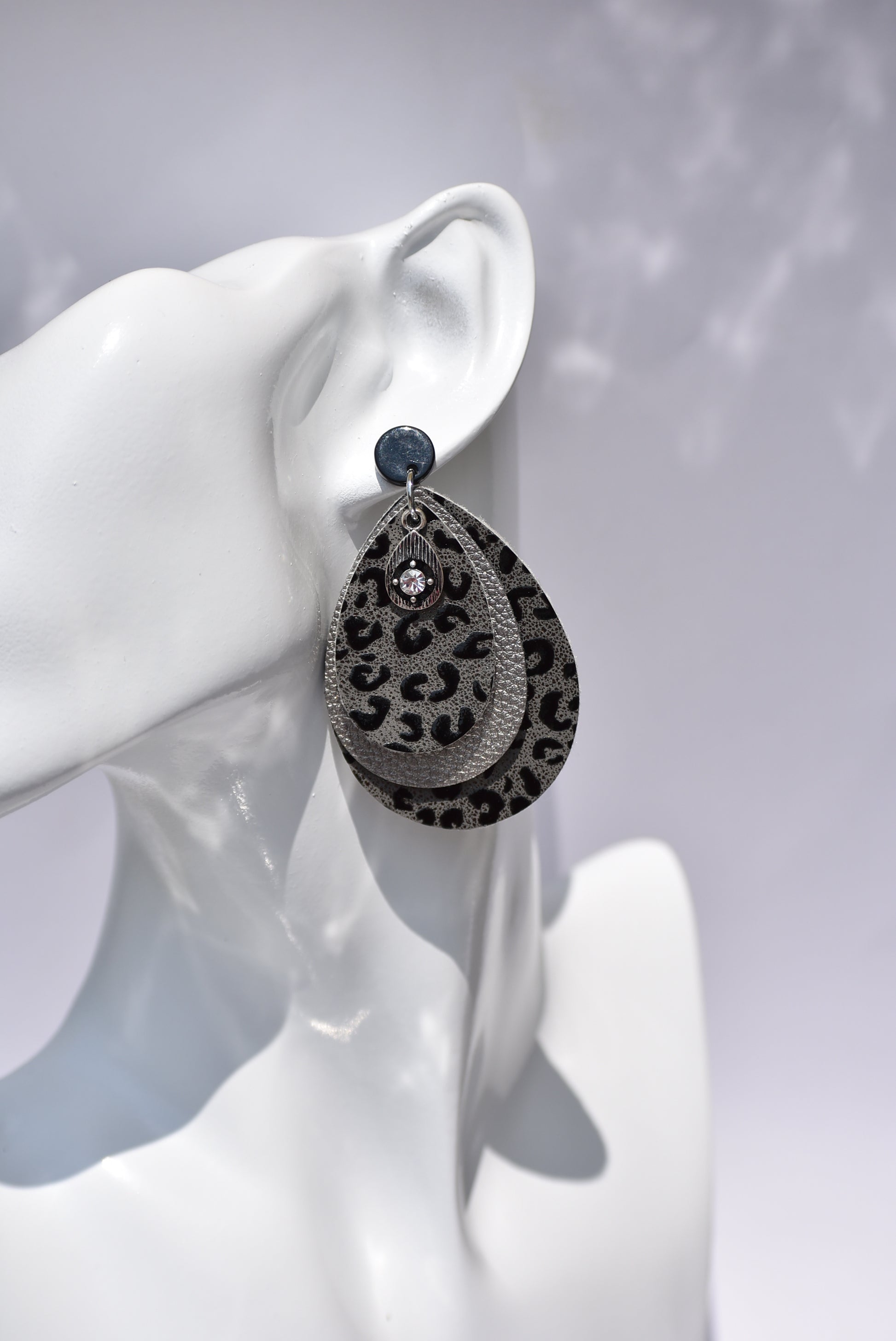 Black posts hold these gray/black leopard earrings with a pretty crystal charm. Super comfortable and perfect for that black sweater or shirt.  Definitely an attention getter.  