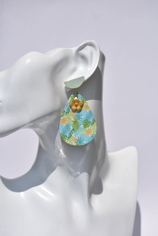 Tropical palm trees pattern in a teardrop shape earring with a pretty yellow flower charm hanging on gold half-moon posts.  This is a one-of-a-kind piece.  